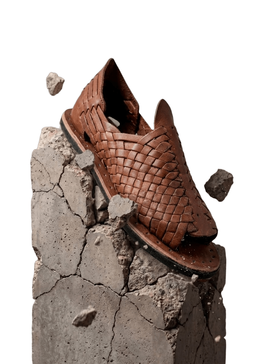 Woven leather huarache handmade in Guadalajara standing on stone